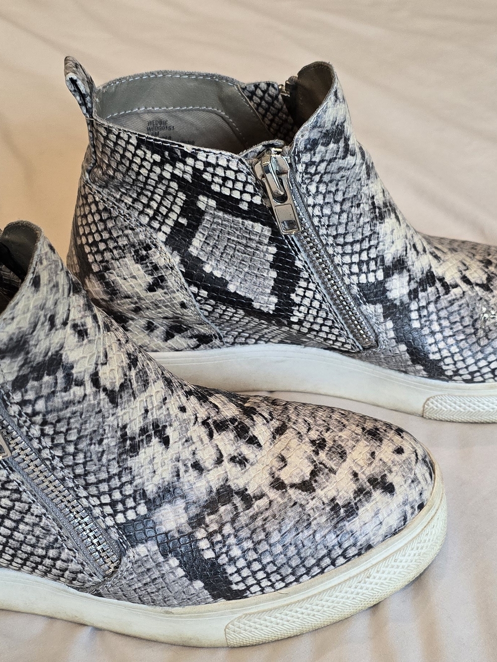 Steve Madden Snake Print Slip-On Sneakers in Black and White